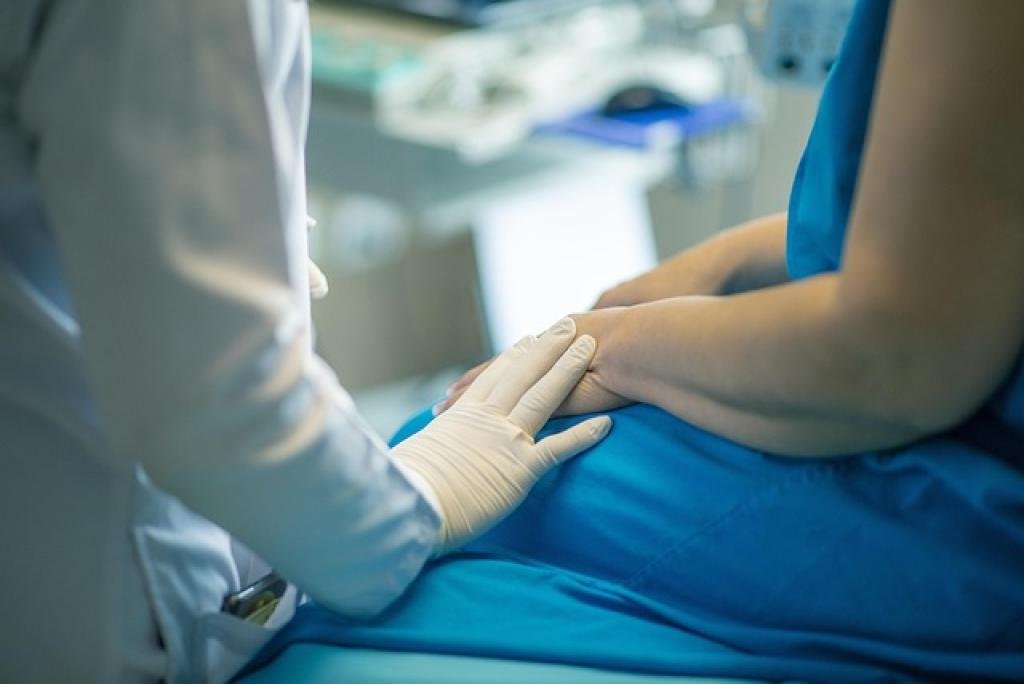 a person holding a person's hand